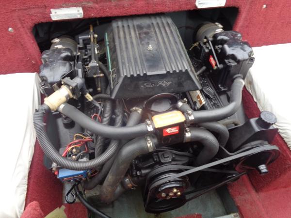 Slide: The Image of 1988 Sea Ray Seville 20 Bow Rider engine compartment with visible components. - 6
