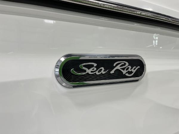 Slide: The Image of 2024 Sea Ray SLX 260 logo on white boat exterior - 79