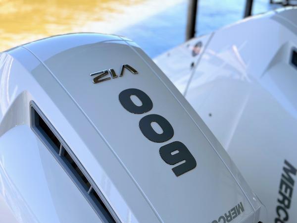 Slide: The Image of Close-up of 2023 Sea Ray SLX 400 OB outboard engine. - 34