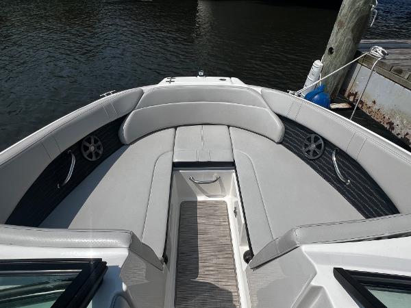 Slide: The Image of 2021 Sea Ray SPO 230 boat interior with gray seating and sleek design. - 4