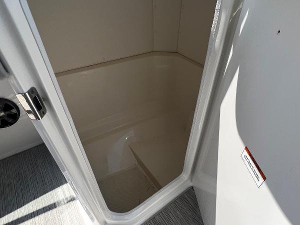 Slide: The Image of 2021 Sea Ray SPO 230 boat interior storage compartment. - 5