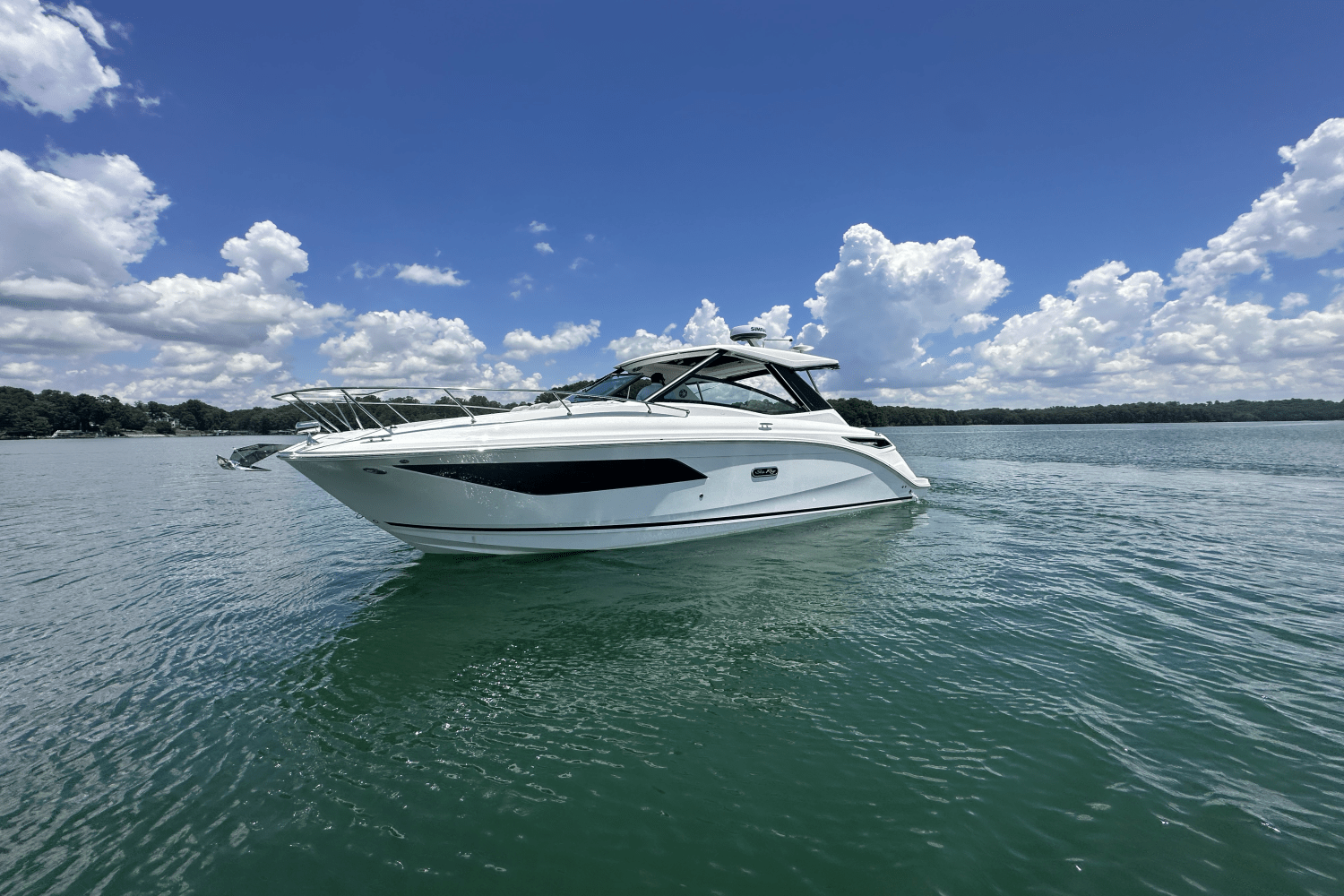 Slide: The Image of Sea Ray Sundancer 320 2025 - 2