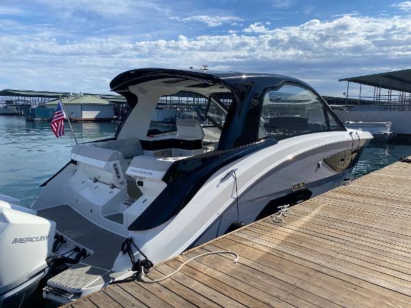 Slide: The Image of 2025 Sea Ray Sundancer 370 OB docked at marina. - 3