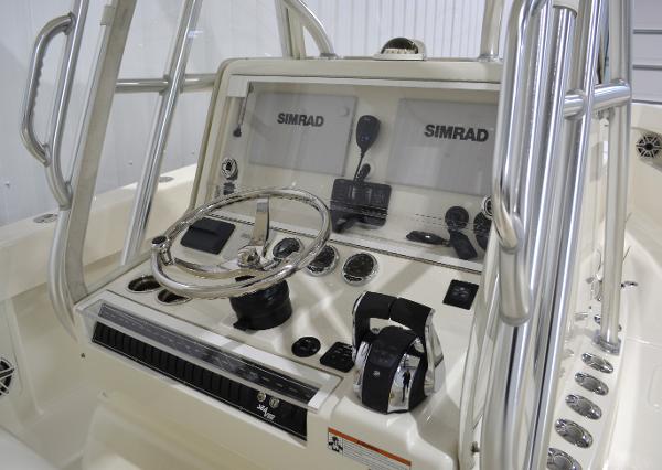 Slide: The Image of 2020 SeaVee 322z boat console with Simrad electronics and steering wheel. - 14