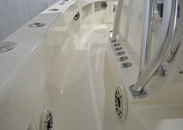 Slide: The Image of 2020 SeaVee 322z boat interior with rod holders and speakers. - 15