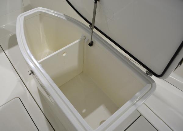 Slide: The Image of Open storage compartment on 2020 SeaVee 322z boat. - 21