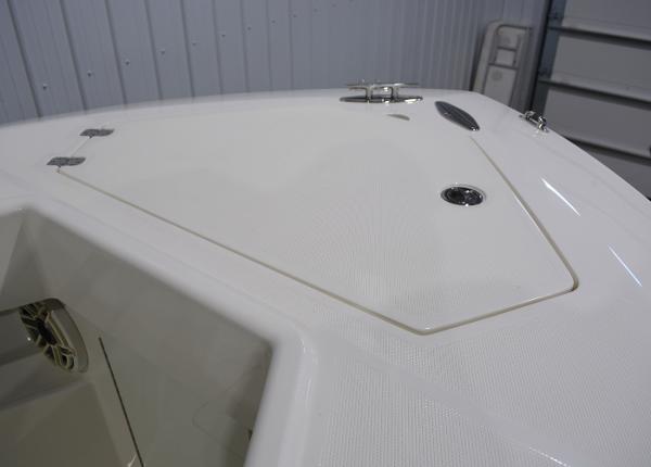 Slide: The Image of 2020 SeaVee 322z boat deck with storage compartment and hardware. - 22
