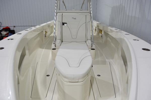 Slide: The Image of 2020 SeaVee 322z boat interior with white seating and sleek design. - 24
