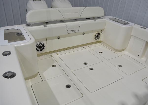 Slide: The Image of 2020 SeaVee 322z boat deck with storage compartments and seating. - 31