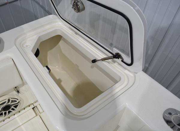 Slide: The Image of 2020 SeaVee 322z boat storage compartment with open lid. - 33