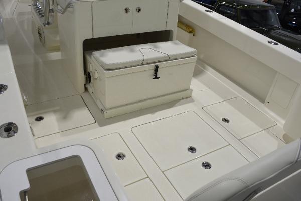 Slide: The Image of 2020 SeaVee 322z boat deck with storage compartments and seating. - 5