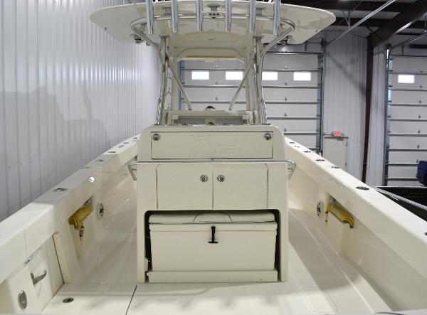 Slide: The Image of 2020 SeaVee 322z boat interior with center console and storage compartments. - 6