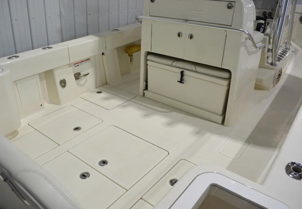 Slide: The Image of 2020 SeaVee 322z boat interior with storage compartments and seating area. - 9