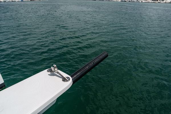 Slide: The Image of Seawind 1600 catamaran detail, 2024 model, on calm water. - 14