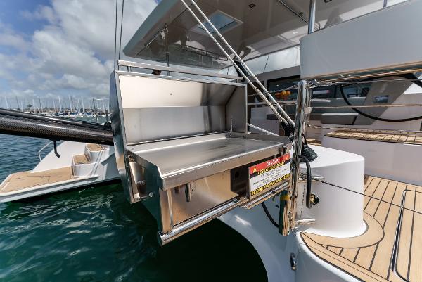 Slide: The Image of 2024 Seawind 1600 yacht with stainless steel outdoor grill on deck. - 20