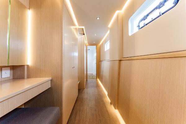 Slide: The Image of 2024 Seawind 1600 yacht interior with modern wood finish and ambient lighting. - 31