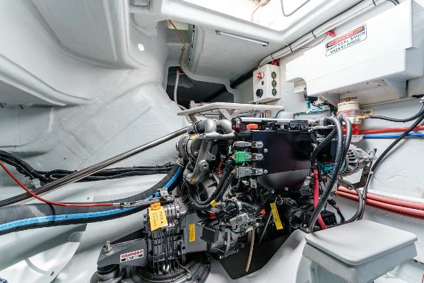 Slide: The Image of Engine compartment of 2024 Seawind 1600 yacht, showcasing intricate wiring and components. - 46