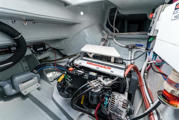 Slide: The Image of Engine compartment of 2024 Seawind 1600 catamaran, featuring Yanmar engine and modern components. - 47