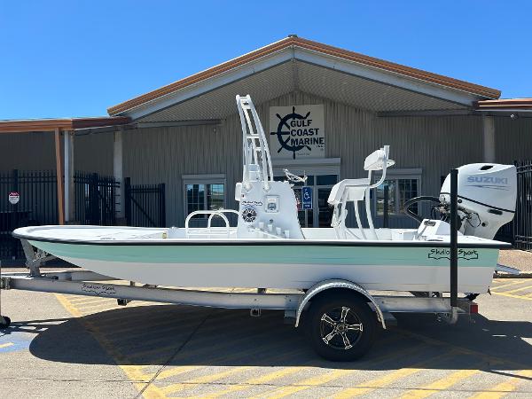 Slide: The Image of 2024 Shallow Sport 18 Sport boat on trailer at Gulf Coast Marine. - 0