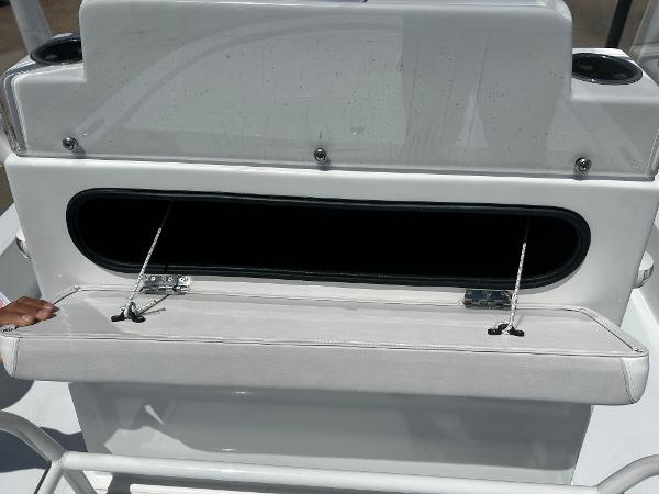 Slide: The Image of 2024 Shallow Sport 18 Sport boat storage compartment open - 11
