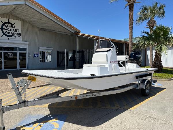 Slide: The Image of 2024 Shallow Stalker CAT-204 boat on trailer at Gulf Coast Marine dealership. - 1