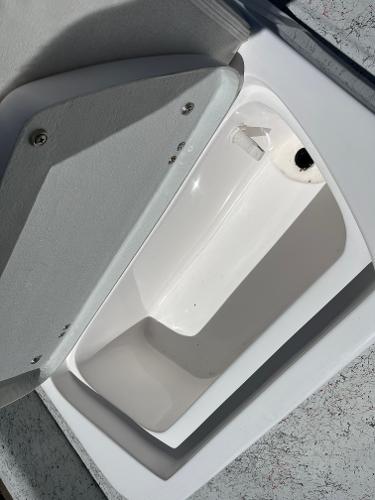 Slide: The Image of Open storage compartment of 2024 Shallow Stalker CAT-204 boat. - 12