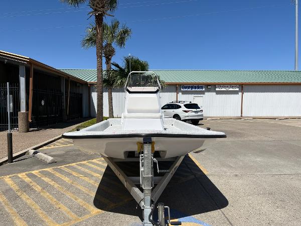 Slide: The Image of 2024 Shallow Stalker CAT-204 boat on trailer in parking lot. - 2