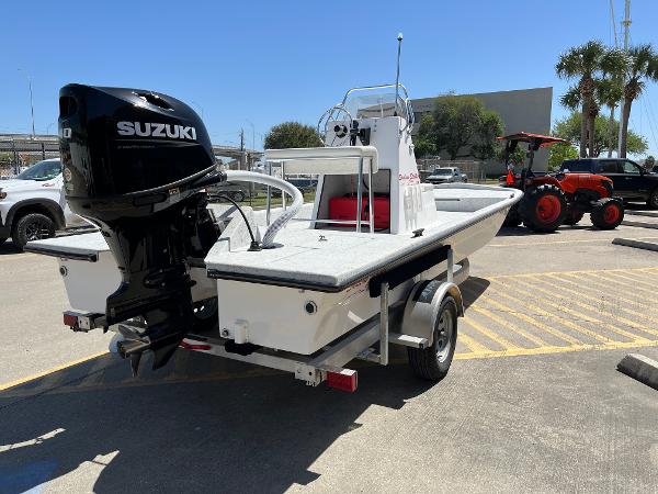 Slide: The Image of 2024 Shallow Stalker CAT-204 boat with Suzuki outboard motor on trailer. - 5