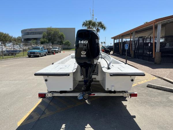 Slide: The Image of 2024 Shallow Stalker CAT-204 boat with 140 HP Suzuki engine, rear view. - 6