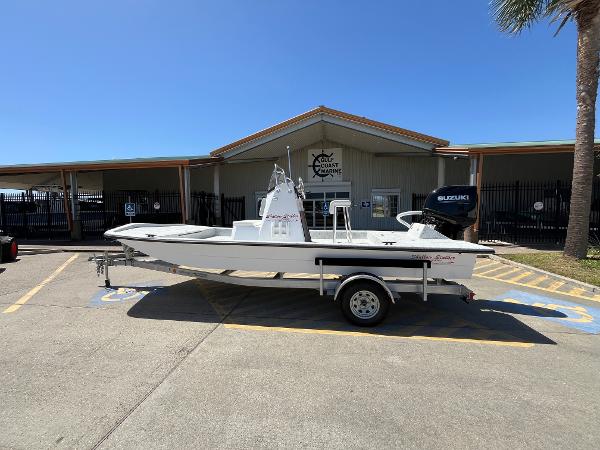 Slide: The Image of 2024 Shallow Stalker CAT-204 boat on trailer outside Gulf Coast Marine. - 9