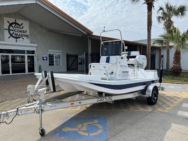 Slide: The Image of 2024 Shallow Stalker SS-17 Sportsman boat on trailer at Gulf Coast Marine dealership. - 1