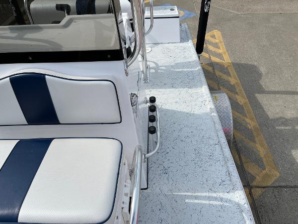Slide: The Image of 2024 Shallow Stalker SS-17 Sportsman boat interior with white and blue seating. - 13