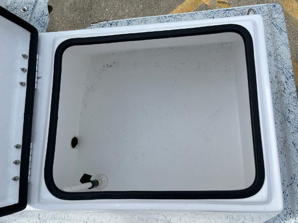 Slide: The Image of 2024 Shallow Stalker SS-17 Sportsman storage compartment with open lid. - 17