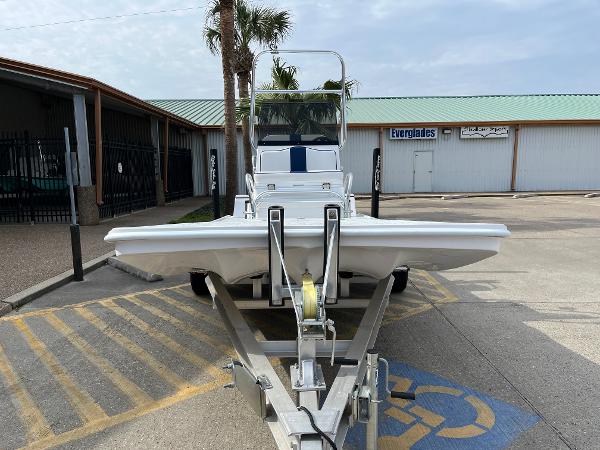 Slide: The Image of 2024 Shallow Stalker SS-17 Sportsman boat on a trailer in a parking lot. - 2