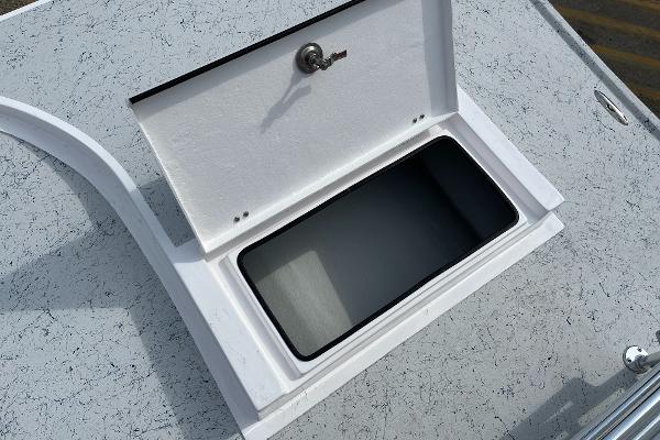 Slide: The Image of Open storage compartment on 2024 Shallow Stalker SS-17 Sportsman boat. - 20