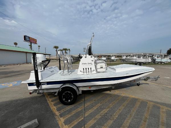 Slide: The Image of 2024 Shallow Stalker SS-17 Sportsman boat on trailer in parking lot. - 4