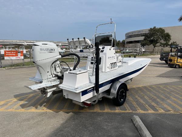 Slide: The Image of 2024 Shallow Stalker SS-17 Sportsman boat with Suzuki outboard motor on trailer. - 5