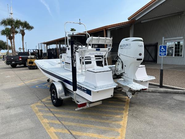 Slide: The Image of 2024 Shallow Stalker SS-17 Sportsman boat with Suzuki engine on trailer in parking lot. - 7