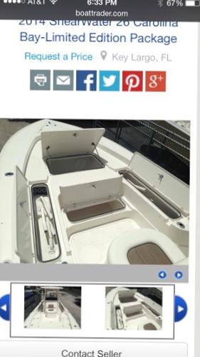 Slide: The Image of 2015 ShearWater 26 Carolina Flair boat interior with storage compartments, Key Largo, FL. - 5