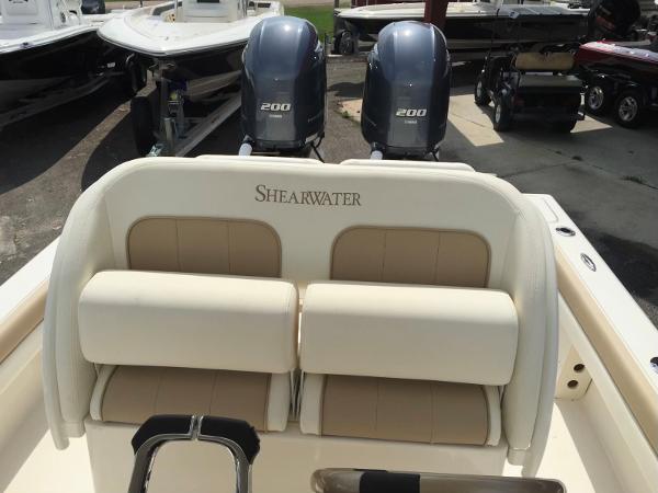 Slide: The Image of 2015 ShearWater 26 Carolina Flair boat with twin 200 horsepower engines. - 6