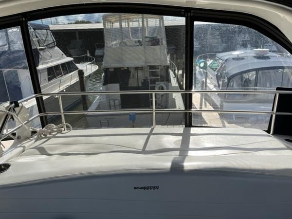 Slide: The Image of View from the deck of a 2001 Silverton 330 Sport Bridge yacht in a marina. - 13