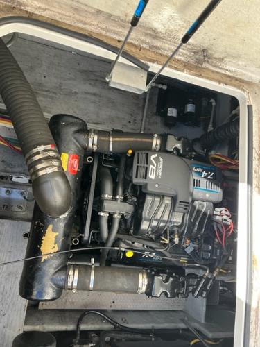 Slide: The Image of Engine compartment of a 2001 Silverton 330 Sport Bridge boat. - 28