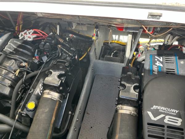 Slide: The Image of Engine compartment of a 2001 Silverton 330 Sport Bridge with twin Mercury MerCruiser V8 engines. - 31
