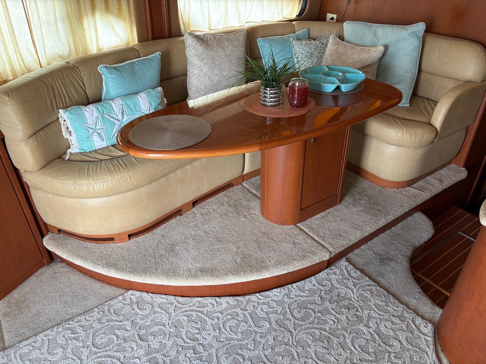 Slide: The Image of Luxurious interior of a 2006 Silverton 38 Sport Bridge with elegant seating and decor. - 22
