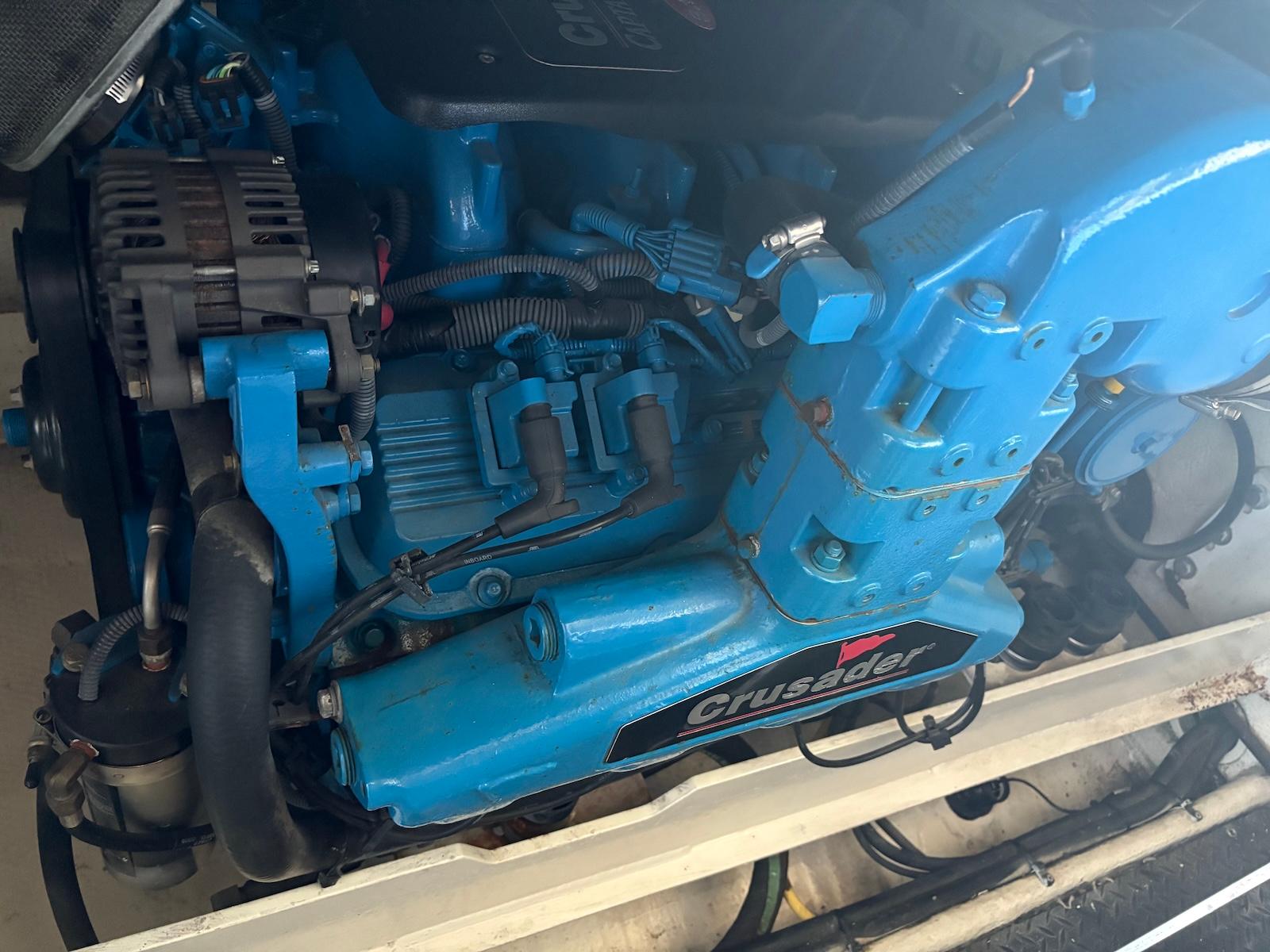 Slide: The Image of Engine of a 2006 Silverton 38 Sport Bridge boat, featuring a Crusader motor. - 32