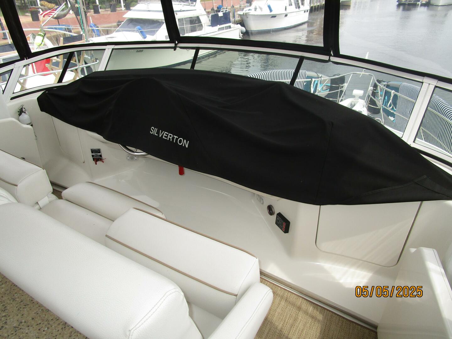Slide: The Image of 43' Silverton flybridge helm cover - 5281702