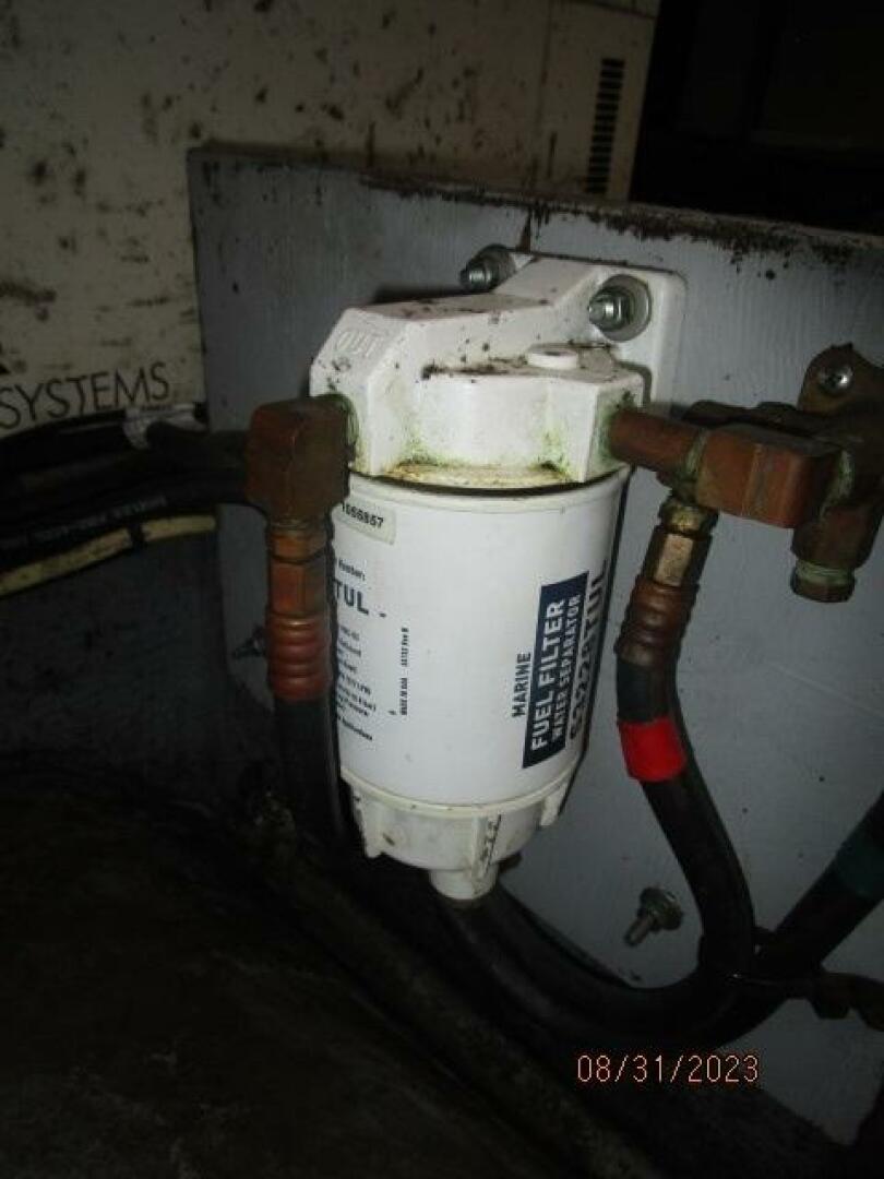 Slide: The Image of 34' Silverton generator fuel filter - 3877856