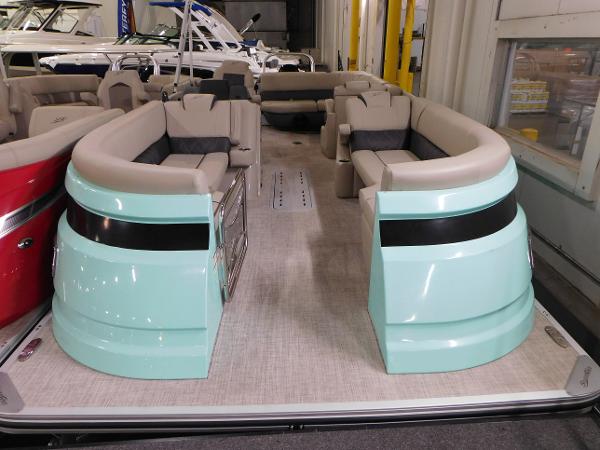 Slide: The Image of 2023 Silver Wave 2410 SW5 L pontoon boat with spacious seating and modern design. - 2