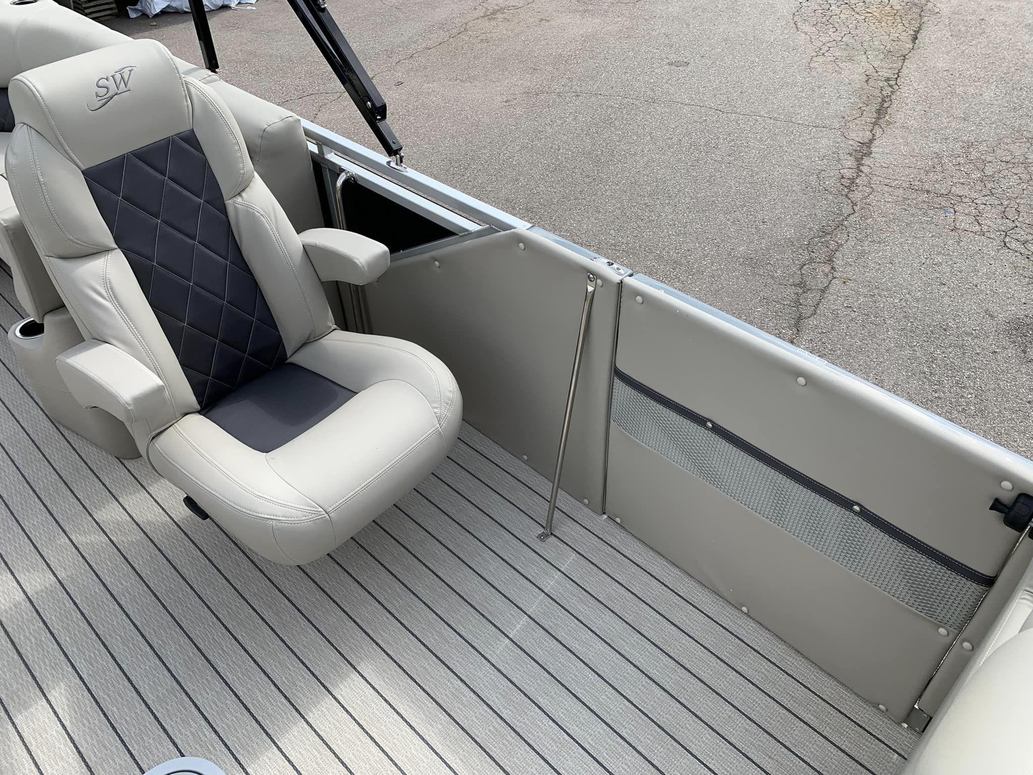 Slide: The Image of 2024 Silver Wave 2610 SW5 CLS boat interior with luxury seating and sleek design. - 12