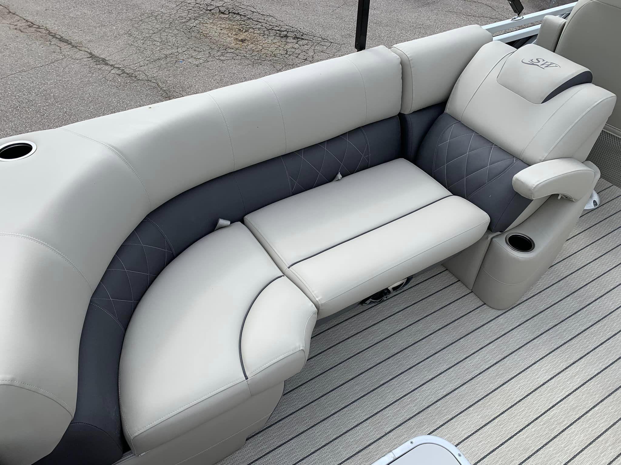Slide: The Image of 2024 Silver Wave 2610 SW5 CLS boat seating with cup holders and quilted design. - 5